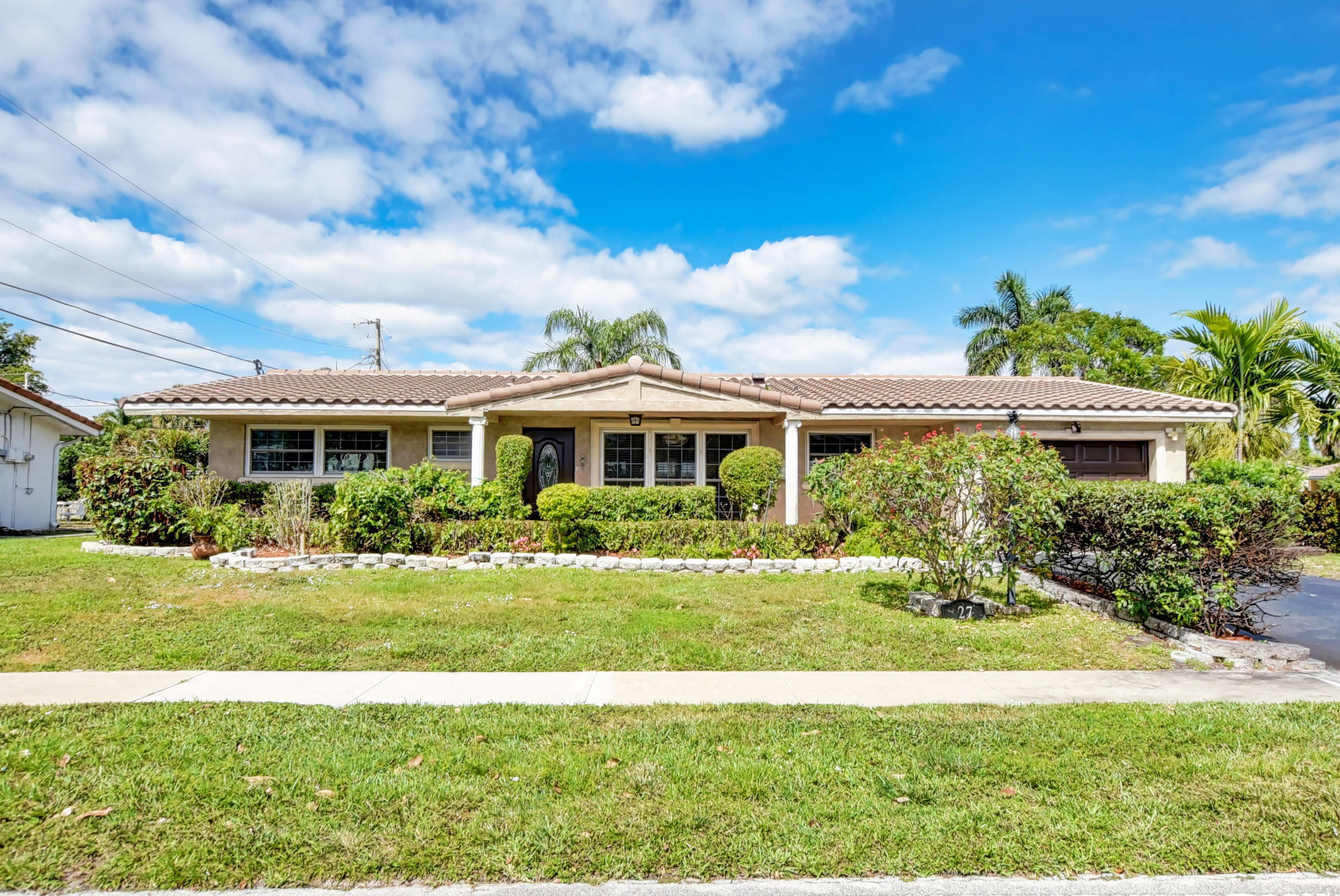 27 Southwest 9th Avenue Boca Raton, FL 33486 - Photo 1 of 55 Front view
