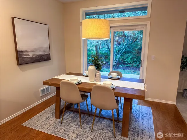 a living room with a couch and a window
