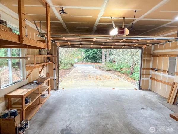 a view of a room with wooden walls