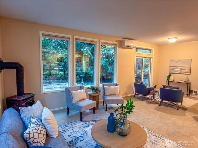 a view of a dining room with furniture window and outside view