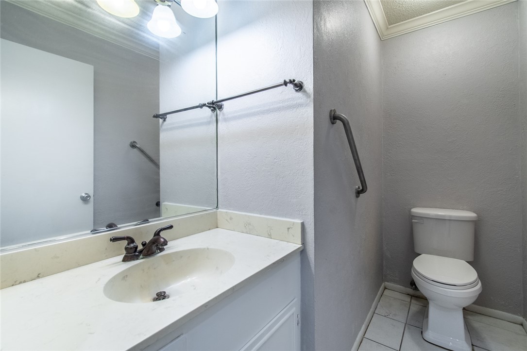 930 Waterview Street Portland, TX 78374 - Photo 22 of 38 a bathroom with a sink toilet and shower