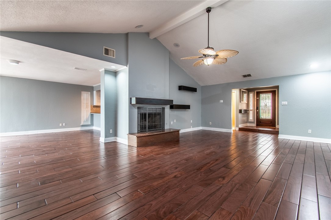 930 Waterview Street Portland, TX 78374 - Photo 30 of 38 a view of a room with wooden floor fireplace and windows
