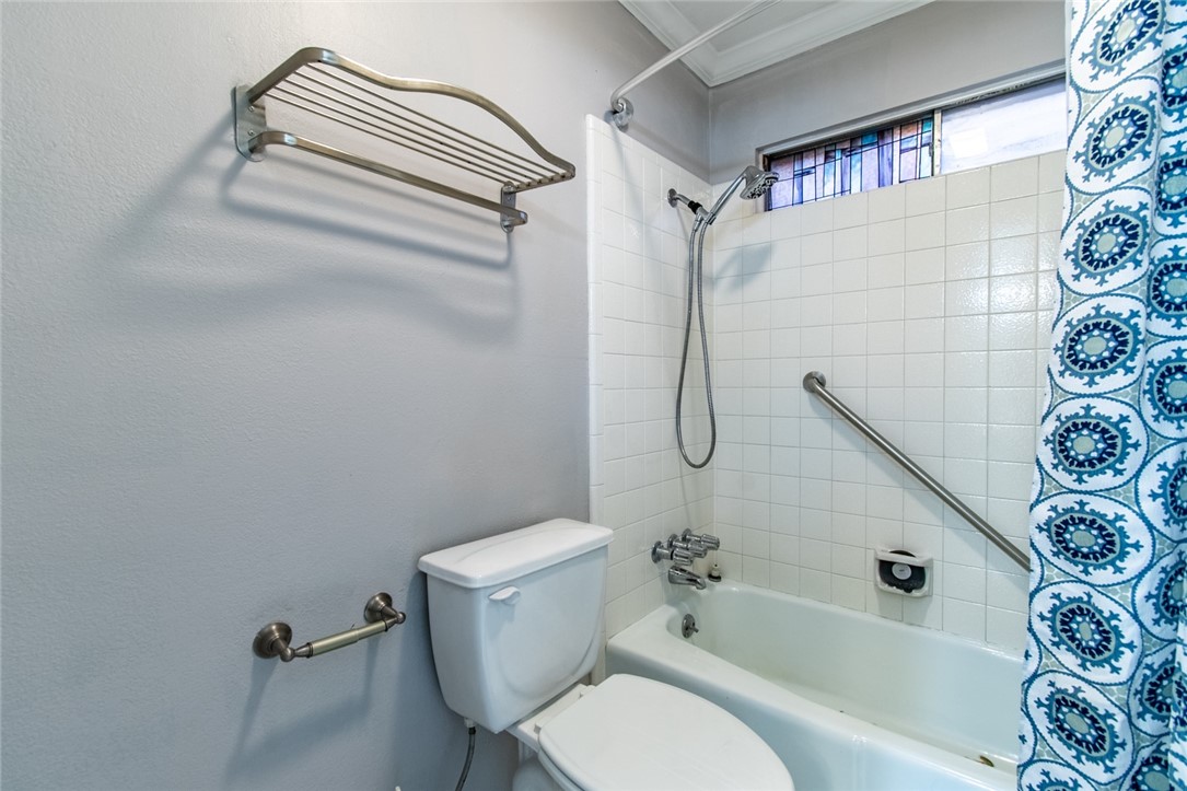 930 Waterview Street Portland, TX 78374 - Photo 37 of 38 a bathroom with a toilet and a shower