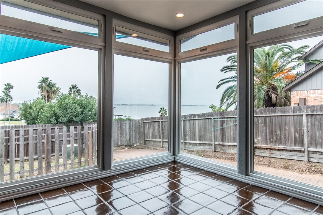 930 Waterview Street Portland, TX 78374 - Photo 9 of 38 a view of front door and porch with wooden floor