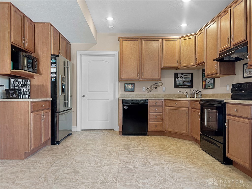 4096 Middle Urbana Road Urbana, OH 43078 - Photo 38 of 96 This spacious kitchen offers ample cabinetry and modern appliances, perfect for everyday living.
