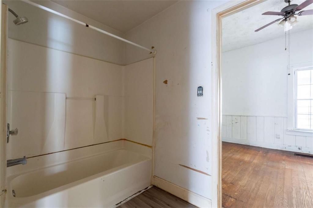 1829 Williams Avenue East Point, GA 30344 - Photo 13 of 21 a bathroom with a bathtub and a shower