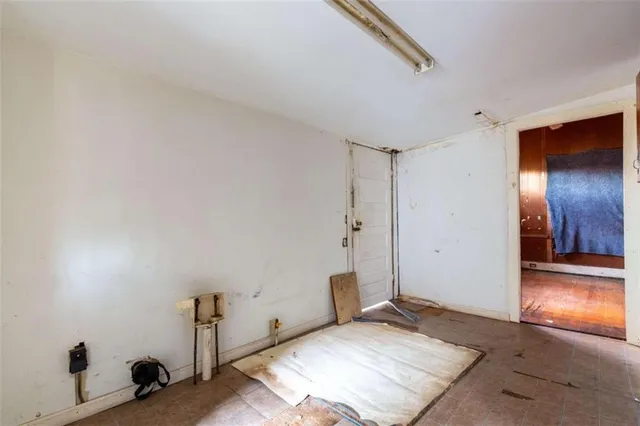 a view of a livingroom with wooden floor