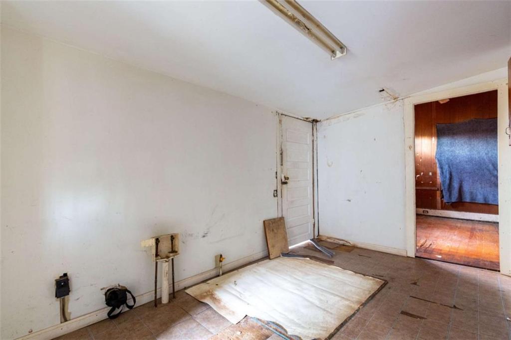 1829 Williams Avenue East Point, GA 30344 - Photo 18 of 21 a view of a livingroom with wooden floor