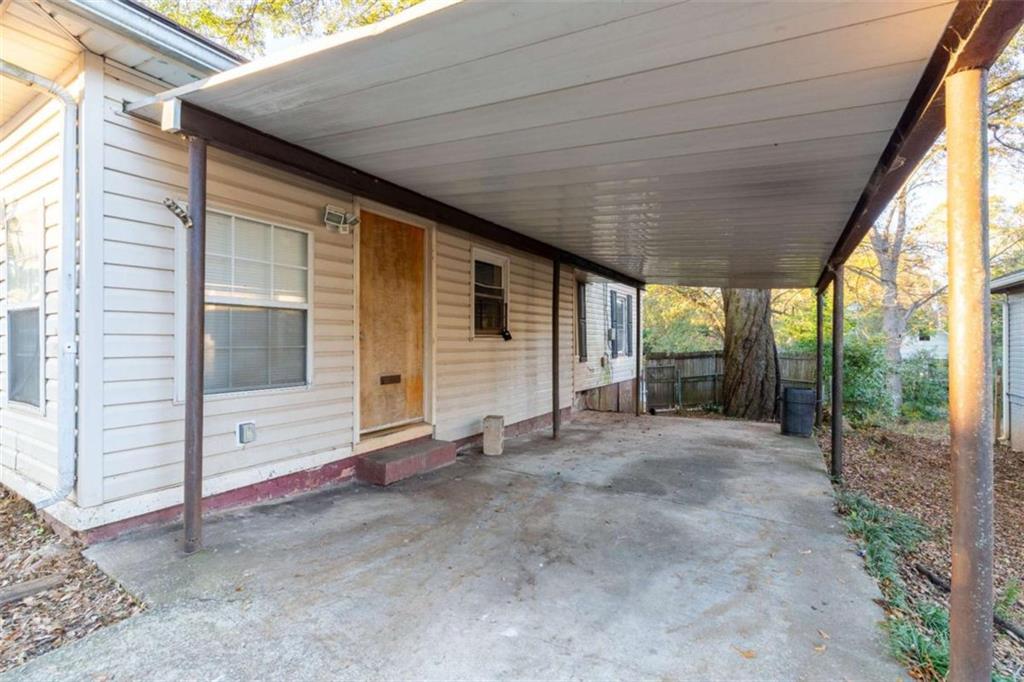 1829 Williams Avenue East Point, GA 30344 - Photo 21 of 21 a view of a house with porch and floor to ceiling window