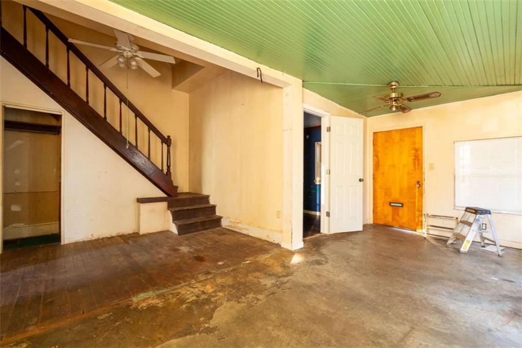 1829 Williams Avenue East Point, GA 30344 - Photo 4 of 21 a view of an empty room with stairs