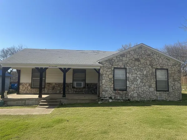 a view of a building with a swimming pool