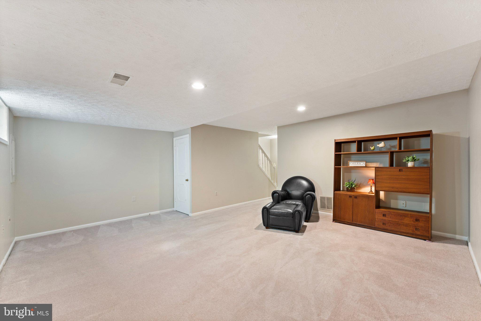 7253 Kousa Lane Springfield, VA 22152 - Photo 33 of 45 Large rec room in basement