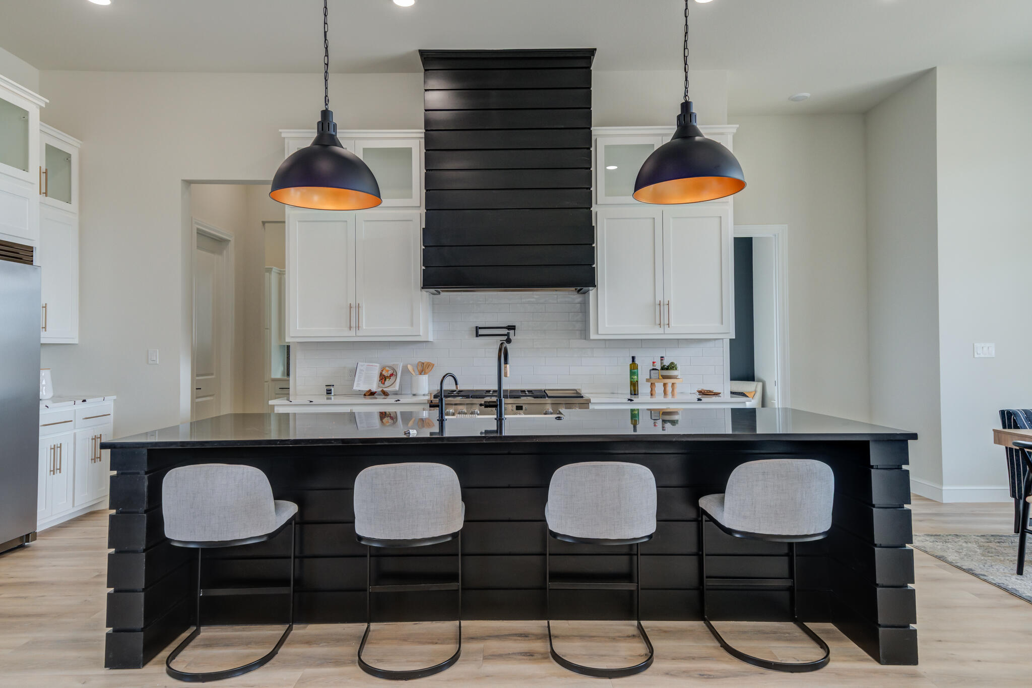 3902 148th Street Lubbock, TX 79423 - Photo 11 of 83 a kitchen with stainless steel appliances granite countertop a sink a stove a table and chairs