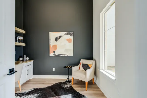a bathroom with a shower and mirror