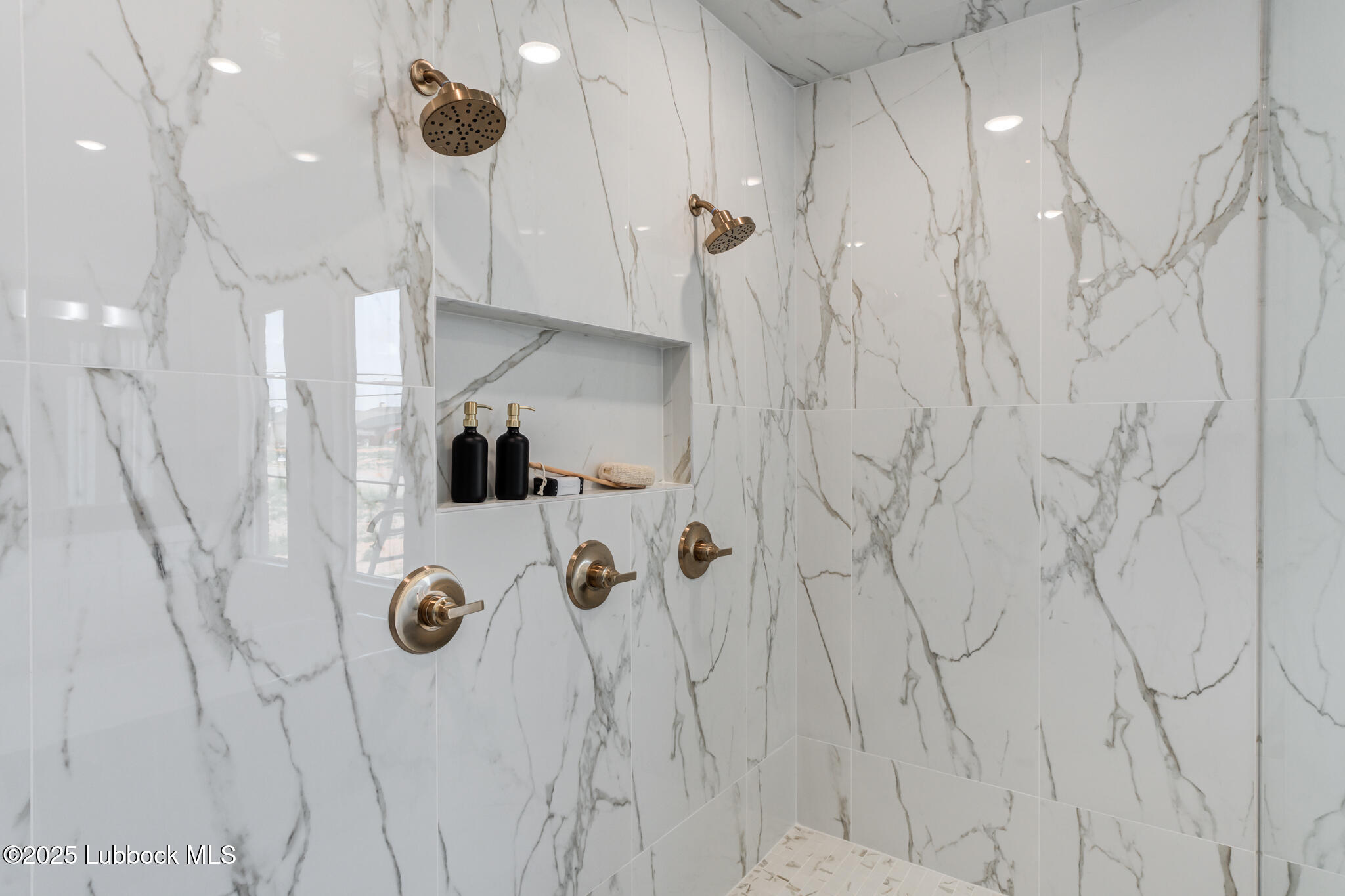 3902 148th Street Lubbock, TX 79423 - Photo 37 of 83 a bathroom with a shower and mirror