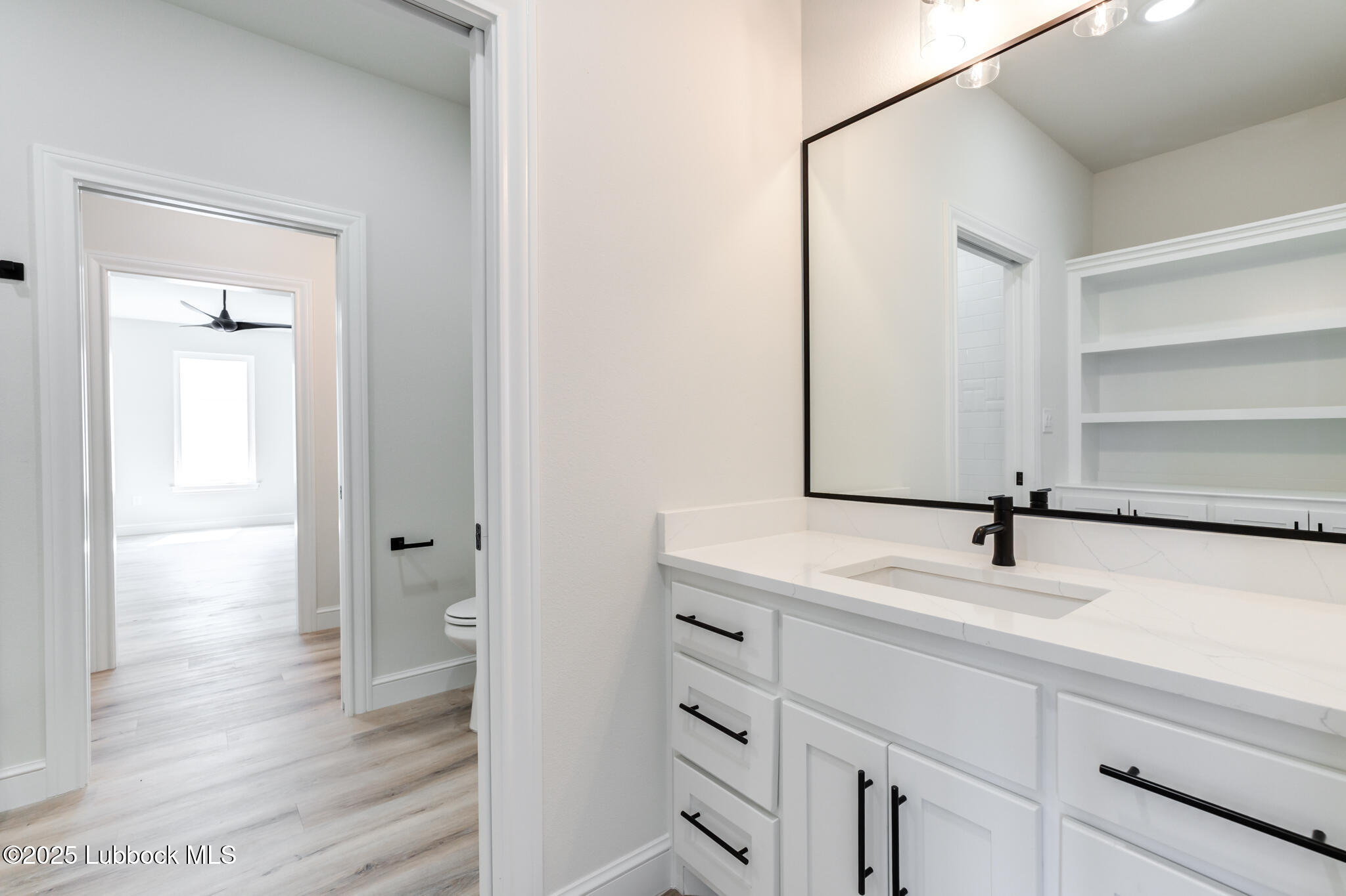 3902 148th Street Lubbock, TX 79423 - Photo 51 of 83 a sink with a vanity