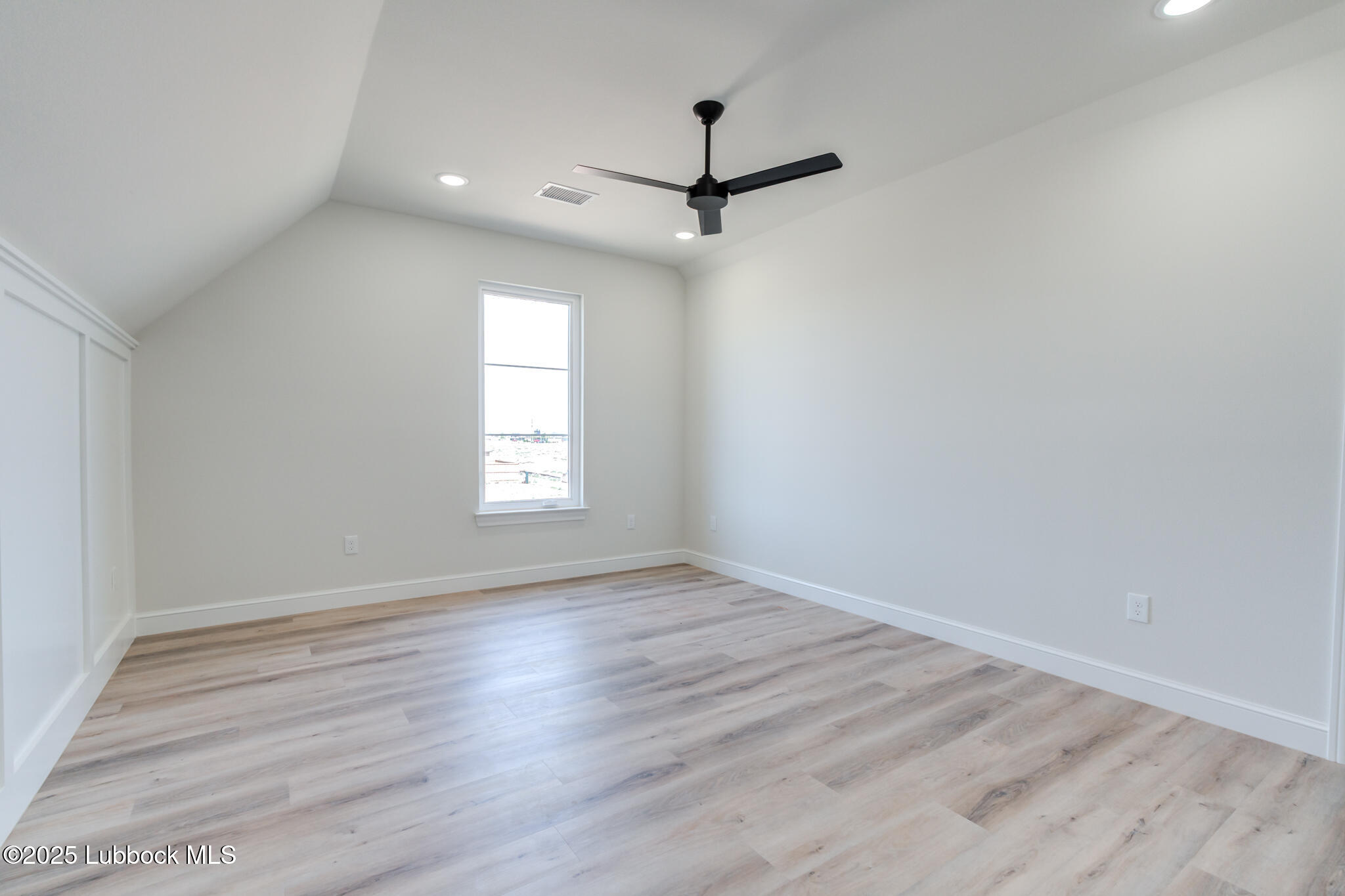 3902 148th Street Lubbock, TX 79423 - Photo 57 of 83 wooden floor in an empty room with a window