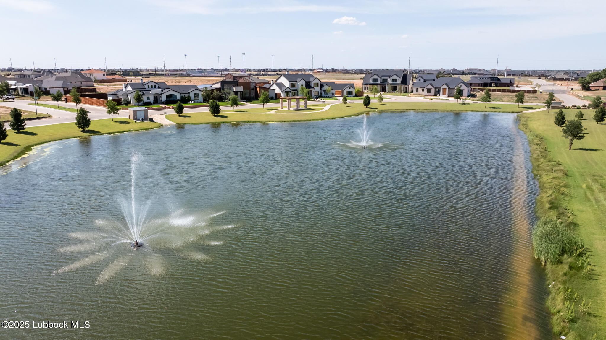 3902 148th Street Lubbock, TX 79423 - Photo 81 of 83 a view of a swimming pool with an ocean view