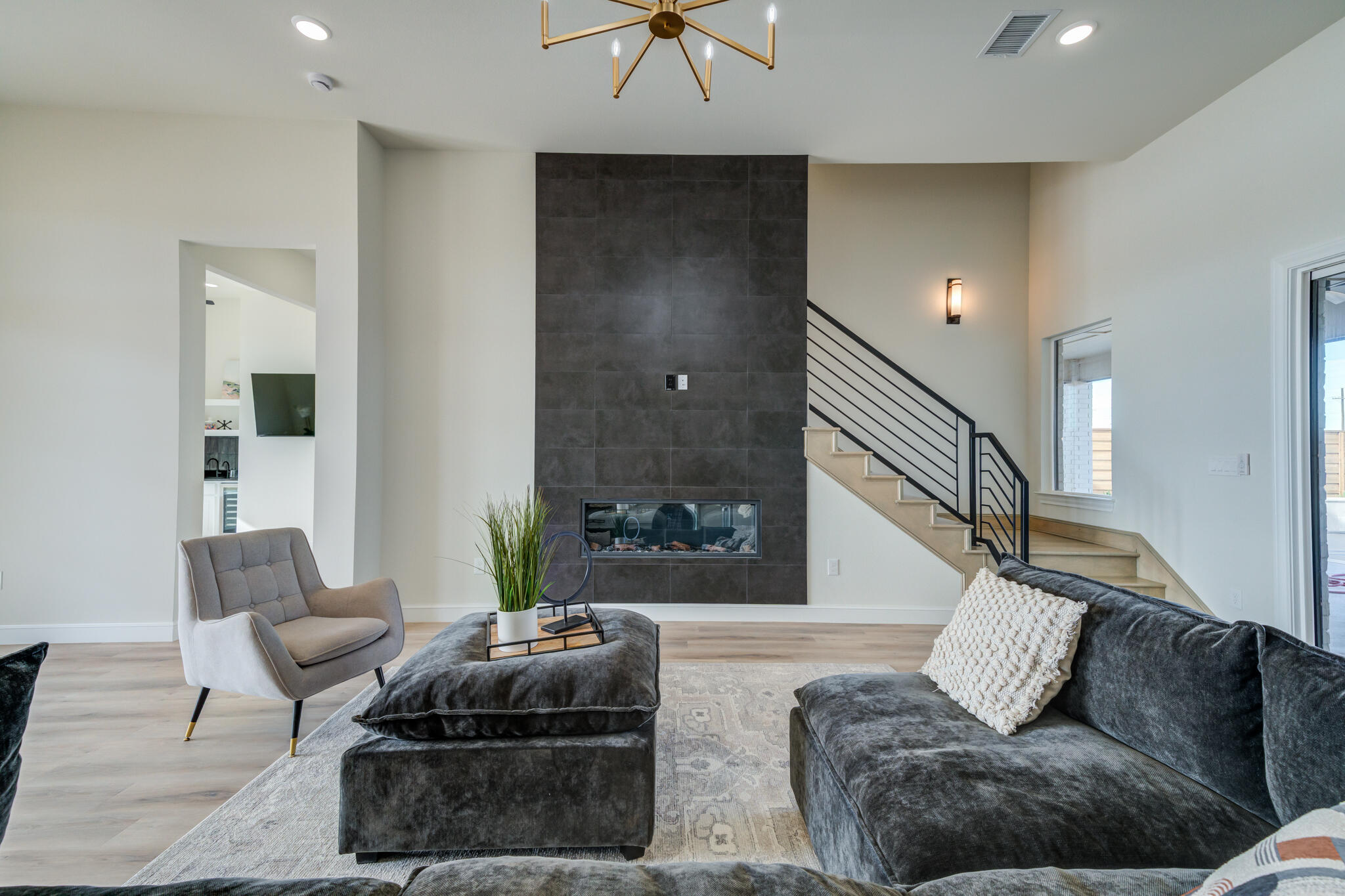 3902 148th Street Lubbock, TX 79423 - Photo 9 of 83 a living room with furniture and a potted plant