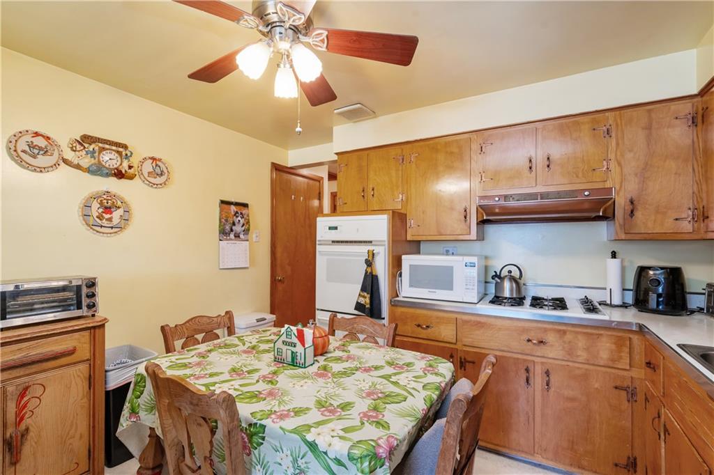 104 Palace Avenue McKees Rocks, PA 15136 - Photo 8 of 25 Newer gas cooktop and wall oven.