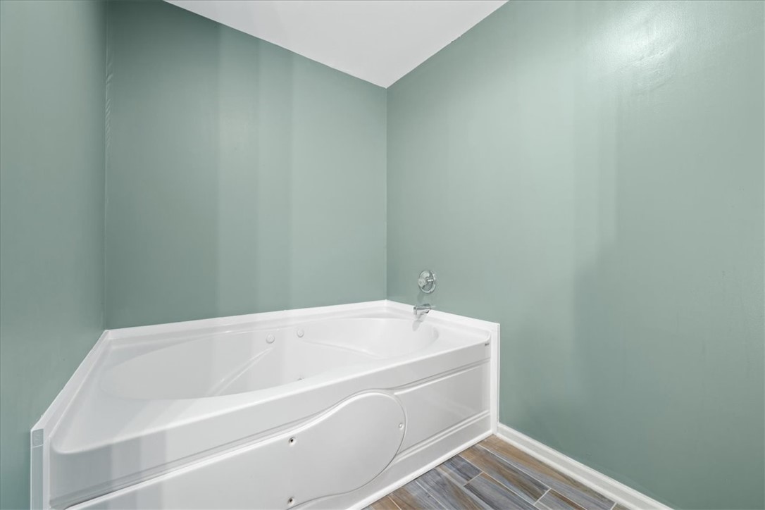 210 Briarcliff Road Central, SC 29630 - Photo 29 of 39 This serene bathroom offers a spacious soaking tub for ultimate relaxation.