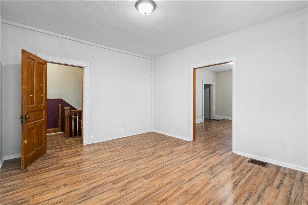 200 Moye Place Pittsburgh, PA 15210 - Photo 19 of 36 a view of hallway with wooden floor