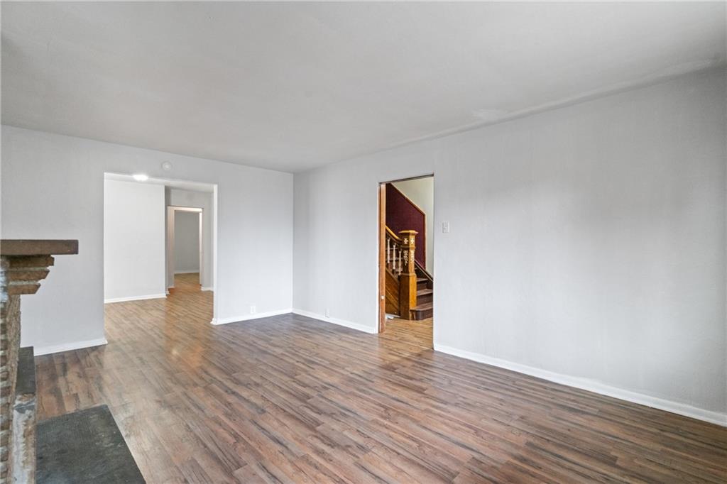 200 Moye Place Pittsburgh, PA 15210 - Photo 6 of 36 a view of an empty room with wooden floor