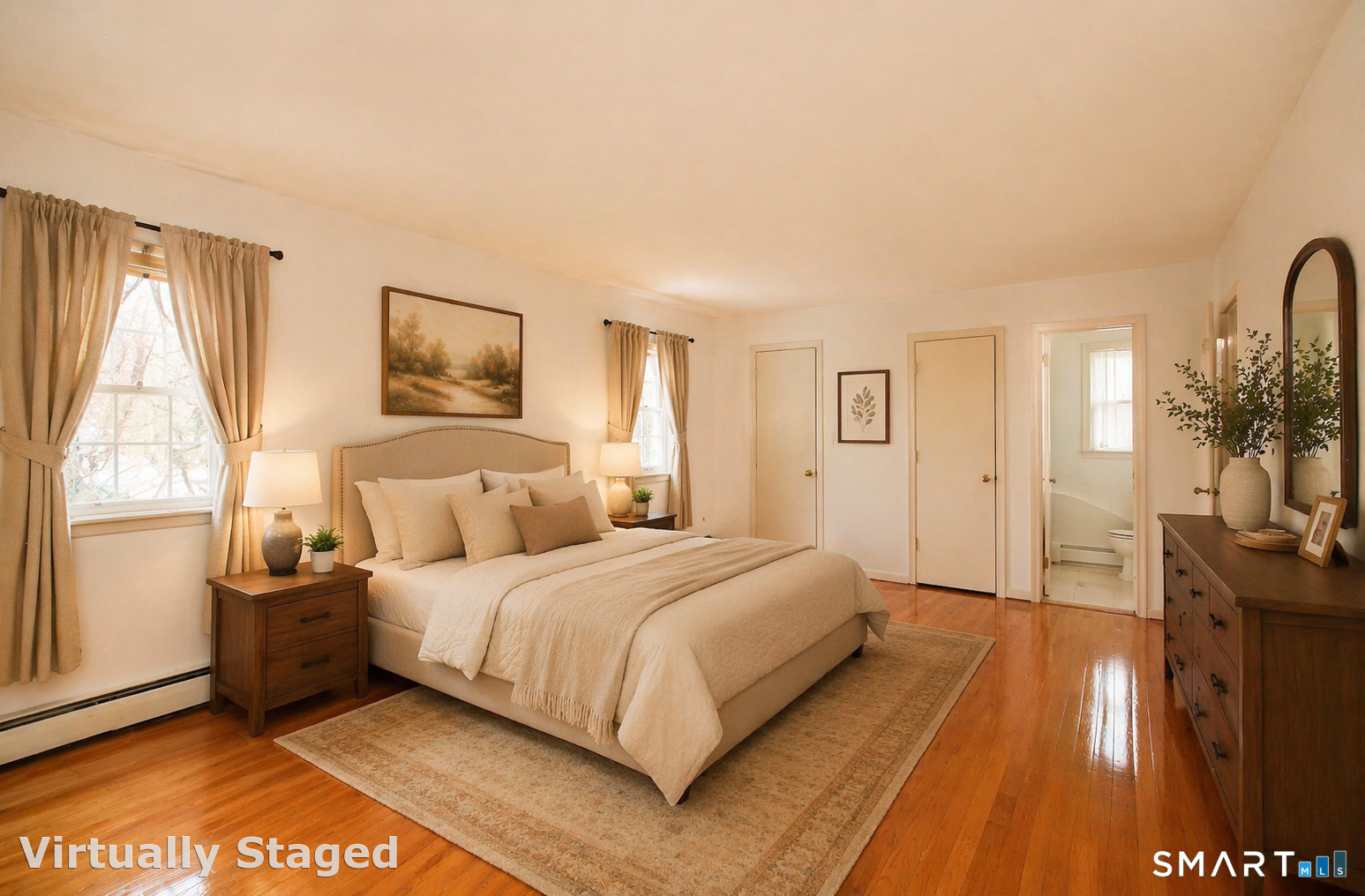 463 Herbert Street Orange, CT 06477 - Photo 31 of 51 a bedroom with a bed a mirror on dresser and a large window