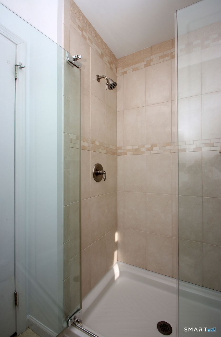 463 Herbert Street Orange, CT 06477 - Photo 32 of 51 a bathroom with a shower
