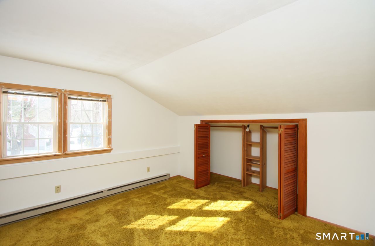 463 Herbert Street Orange, CT 06477 - Photo 34 of 40 an empty room with windows