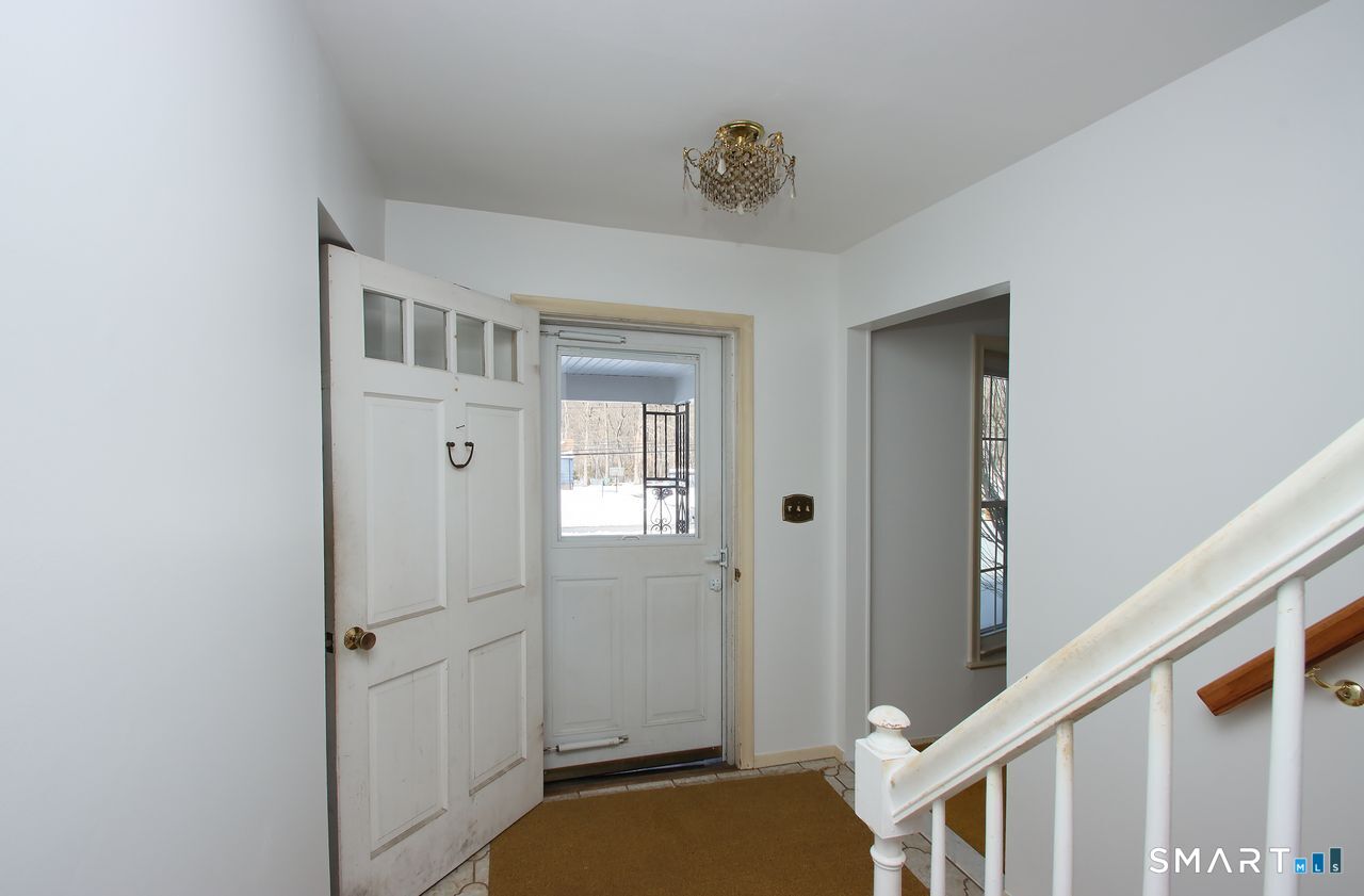 463 Herbert Street Orange, CT 06477 - Photo 6 of 51 a view of a hallway with closet