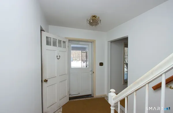 a view of a hallway with closet