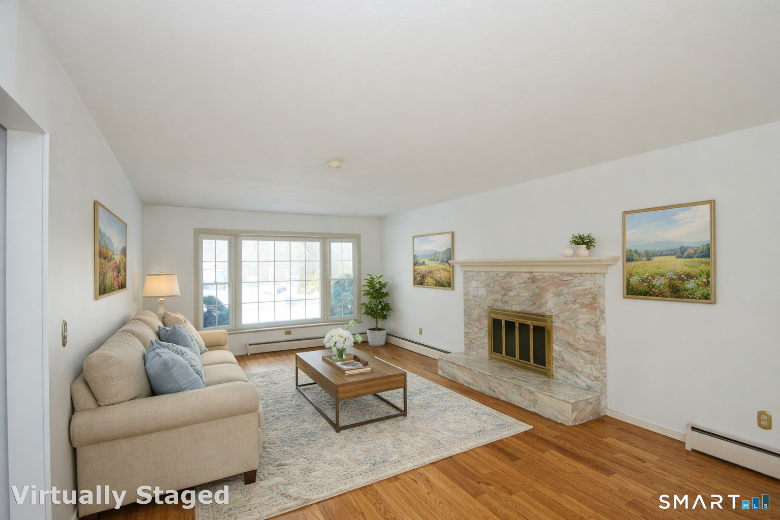 463 Herbert Street Orange, CT 06477 - Photo 10 of 51 a living room with furniture and a fireplace