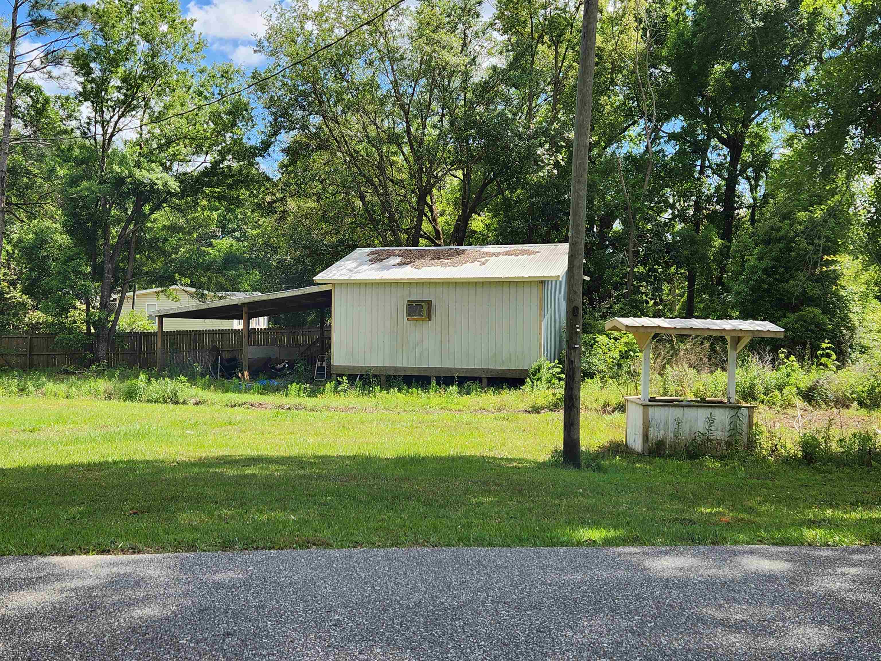 25028 Lavinia Avenue Elberta, AL 36530 - Photo 4 of 14 Lavinia St view Workshop/Well Hs