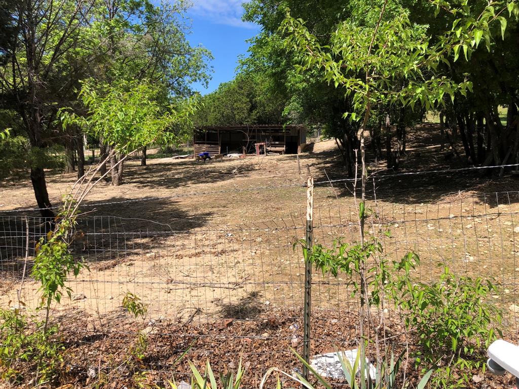 1408 Robyn Road Azle, TX 76020 - Photo 16 of 34 a view of road with trees