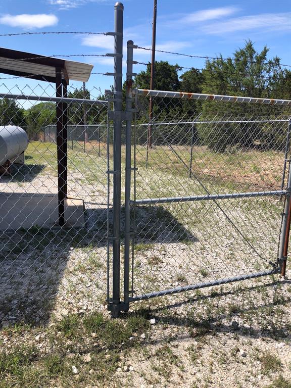 1408 Robyn Road Azle, TX 76020 - Photo 34 of 34 a view of a yard with a street