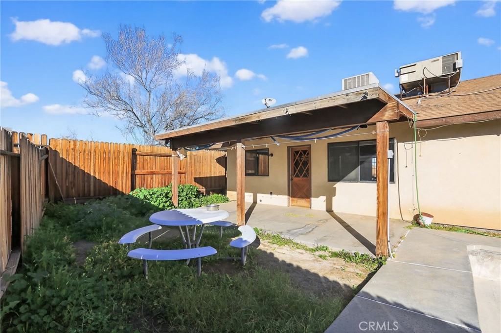 421 Petris Avenue Ridgecrest, CA 93555 - Photo 18 of 18 a front view of a house with a yard