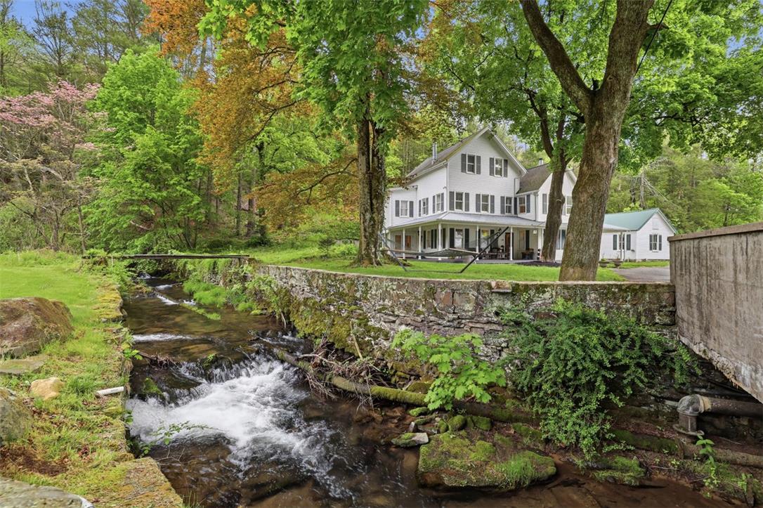 3585 Fairyland Road Lehighton, PA 18235 - Photo 3 of 57 This charming home features a lovely porch and is nestled beside a serene, flowing creek.