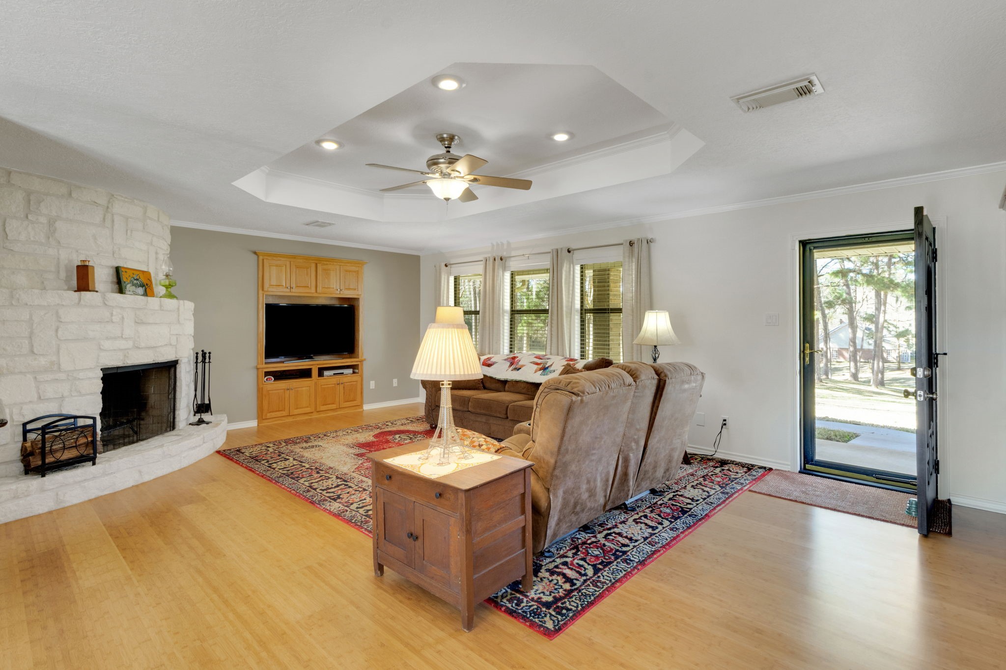 41 Holly Glen Point Blank, TX 77364 - Photo 8 of 35 a living room with fireplace furniture and a flat screen tv