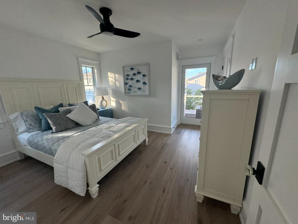 281 7th Street Avalon, NJ 08202 - Photo 15 of 62 a bedroom with a bed and a window