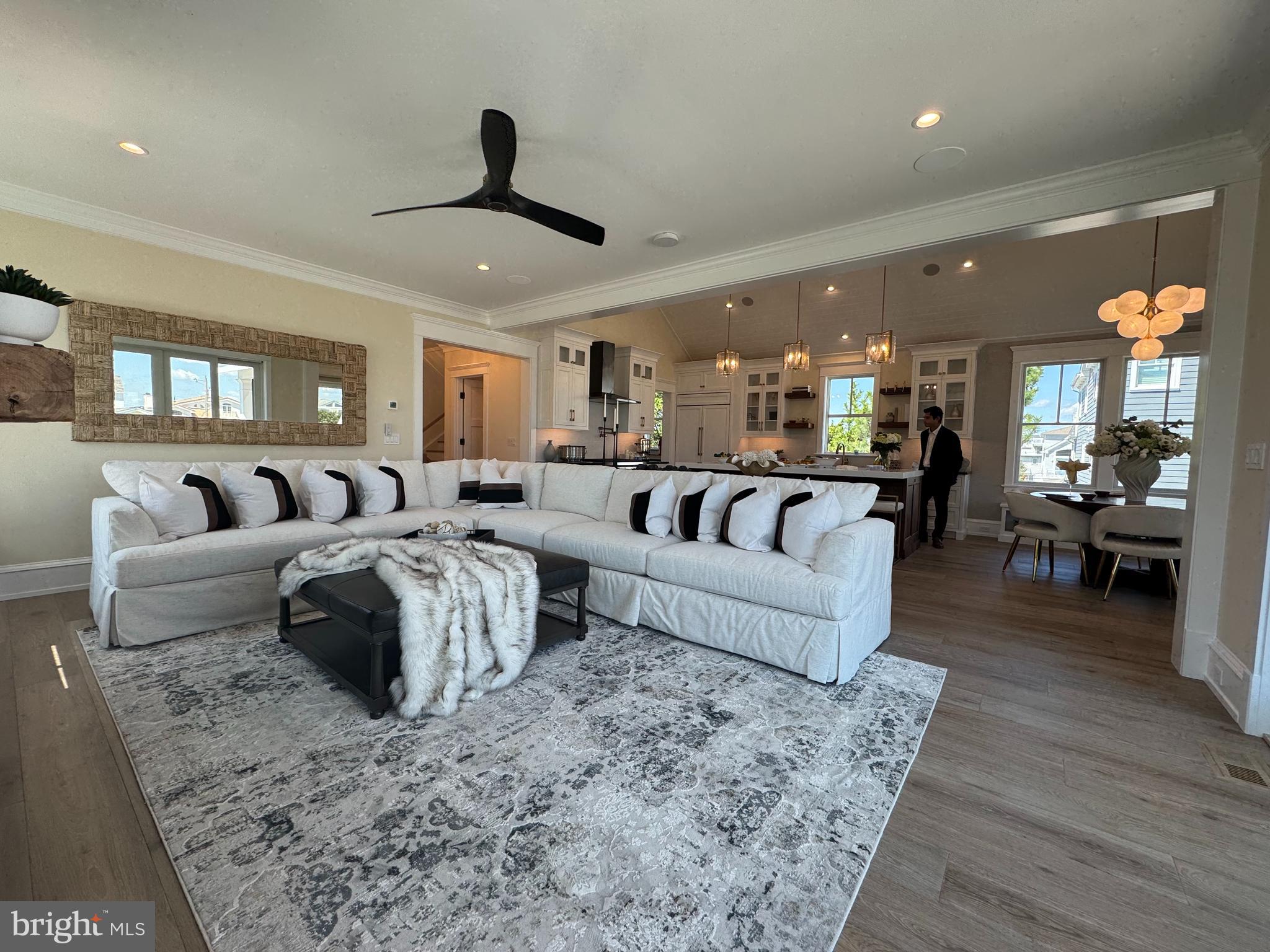 281 7th Street Avalon, NJ 08202 - Photo 23 of 62 a living room with furniture and a ceiling fan
