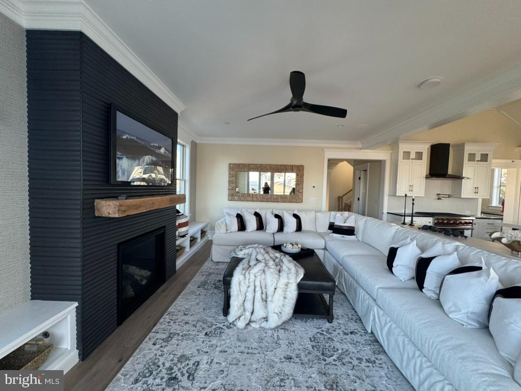 281 7th Street Avalon, NJ 08202 - Photo 24 of 62 a living room with furniture and a fireplace