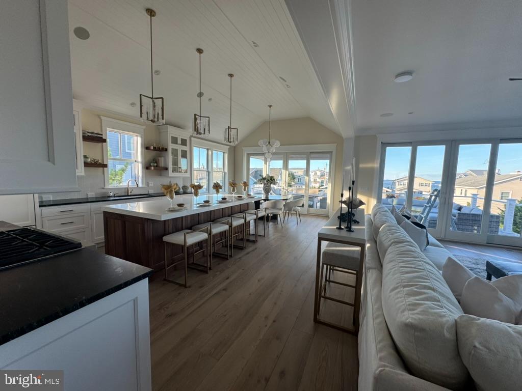 281 7th Street Avalon, NJ 08202 - Photo 27 of 62 a living room with lots of furniture and a large window