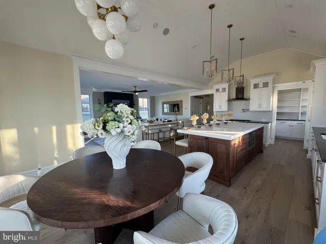 a bathroom with a granite countertop toilet sink and a mirror