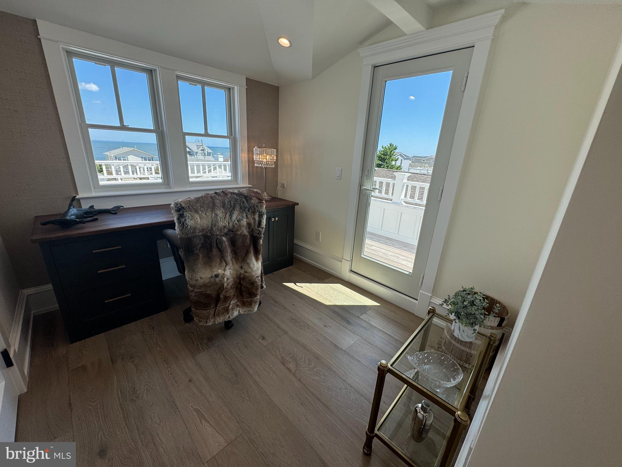 281 7th Street Avalon, NJ 08202 - Photo 45 of 62 a view of a workspace with furniture and a window