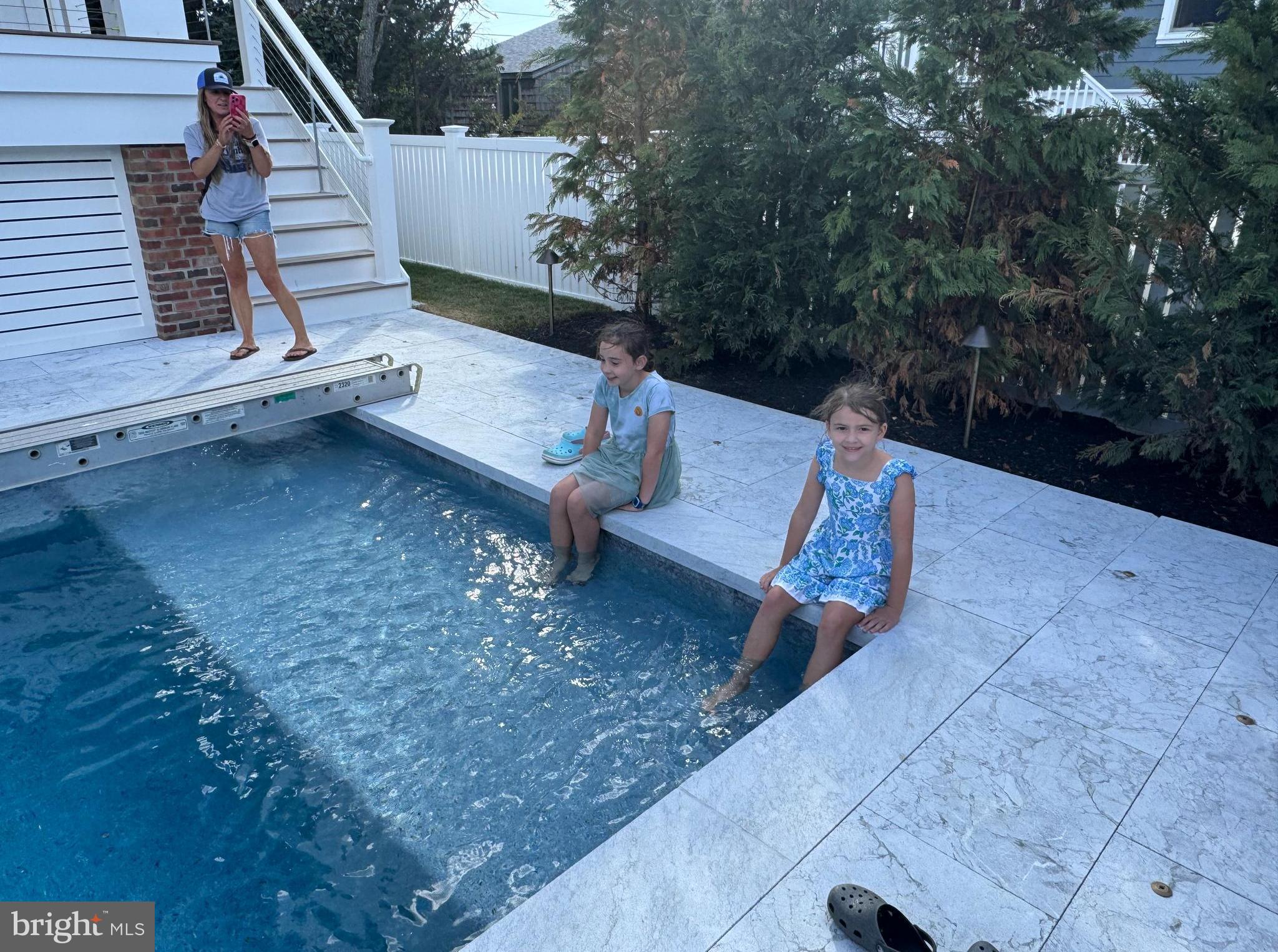 281 7th Street Avalon, NJ 08202 - Photo 52 of 62 a view of a deck with a bench