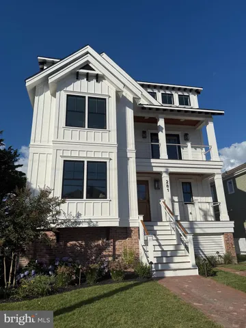 a bedroom with a bed and a mirror