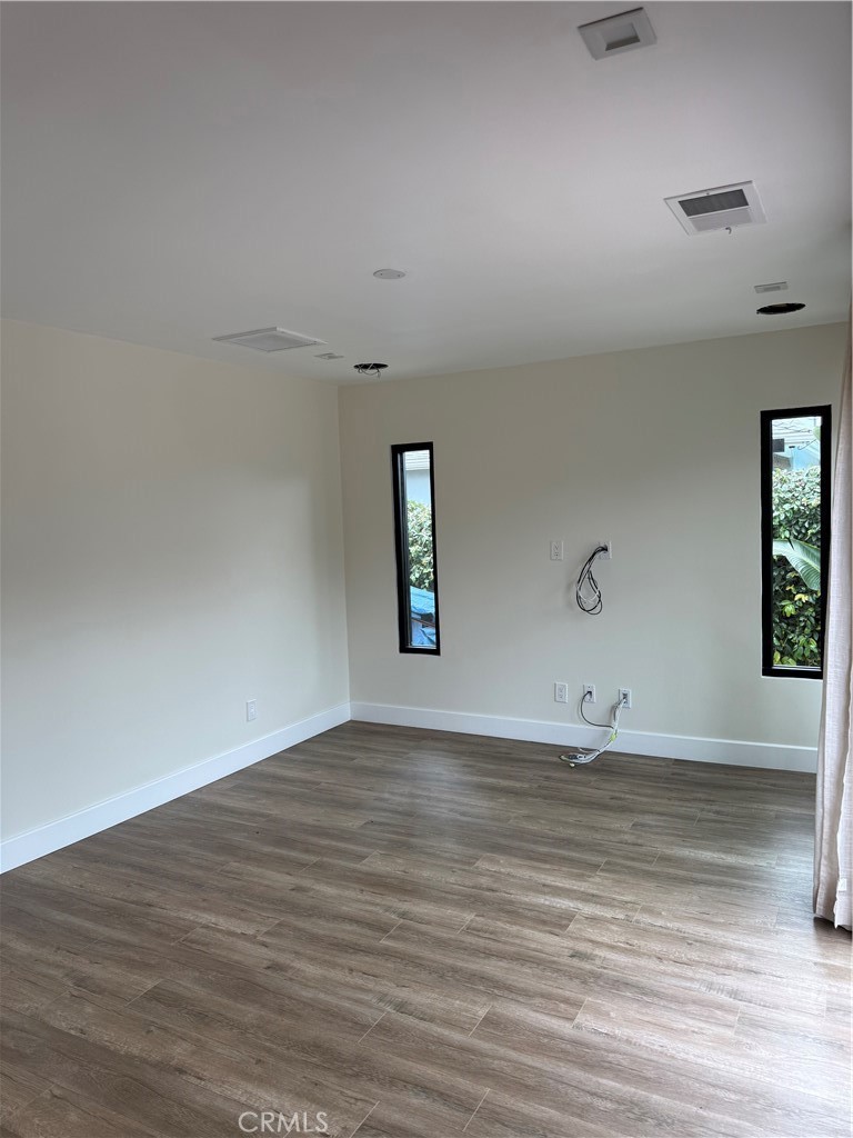 7459 Ruffner Avenue Van Nuys, CA 91406 - Photo 12 of 21 a view of an empty room and window
