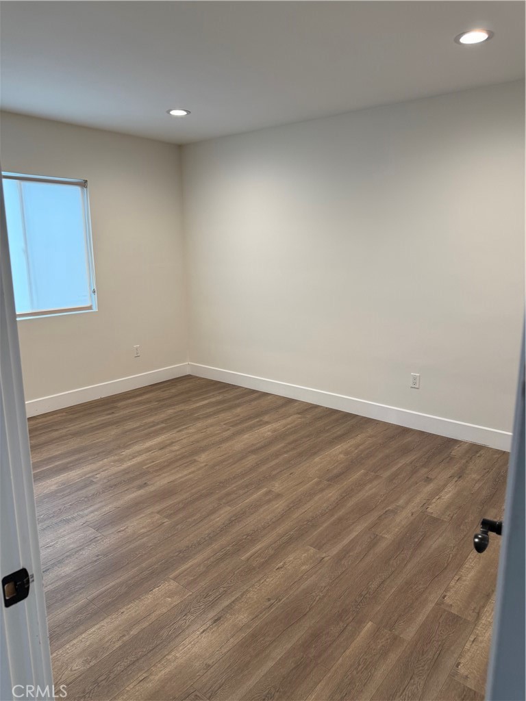 7459 Ruffner Avenue Van Nuys, CA 91406 - Photo 13 of 21 wooden floor in a room