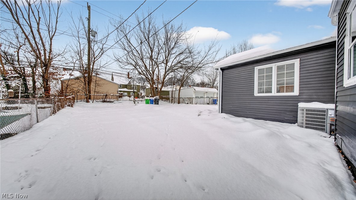 16811 Invermere Avenue Cleveland, OH 44128 - Photo 3 of 47 View of yard covered in snow
